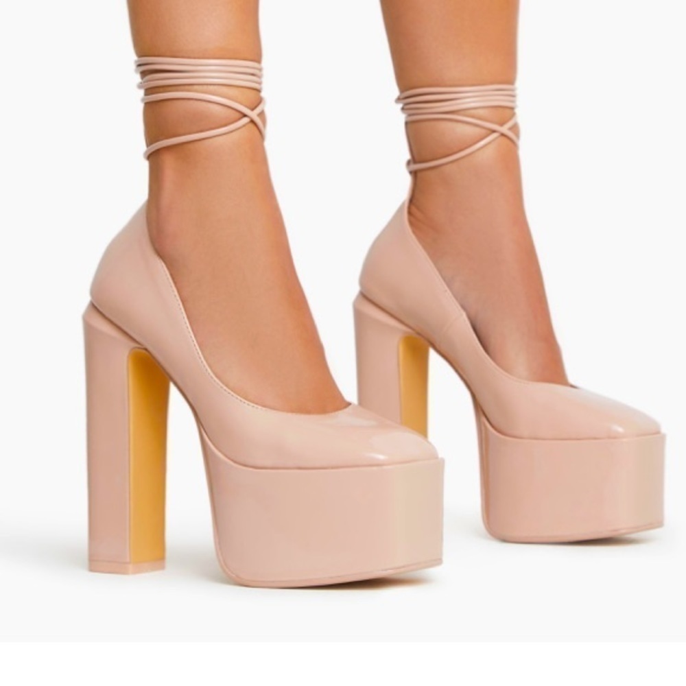 01 - Laced up,closed toes ,platform junky block heels nude patent.